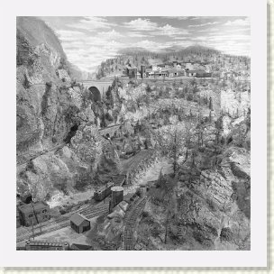 GB_GD3_Squawbottom_Akin_2 * Squawbottom and Akin; note the  switch machines are concealed by buildings. Also of interest is the forced-perspective used in Akin, including a distance railroad yard. * 5349 x 5349 * (15.89MB)